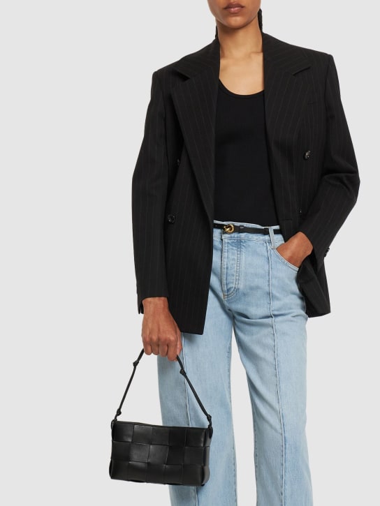 Bottega Veneta: Cassette leather pouch on strap - Black - women_1 | Luisa Via Roma