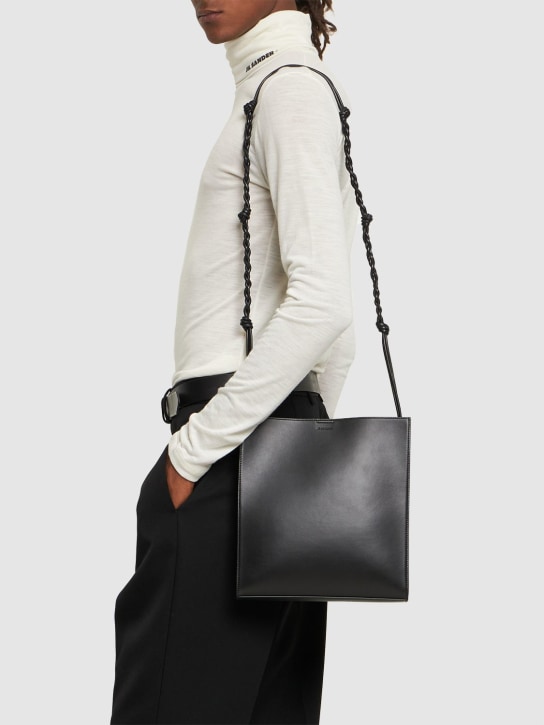 Jil Sander: Medium Tangle leather crossbody bag - Black - men_1 | Luisa Via Roma