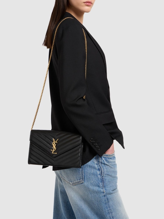 Saint Laurent: Cassandre embossed leather chain wallet - Black - women_1 | Luisa Via Roma