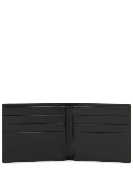 Dolce&Gabbana: Leather printed logo bifold wallet - Black - men_1 | Luisa Via Roma