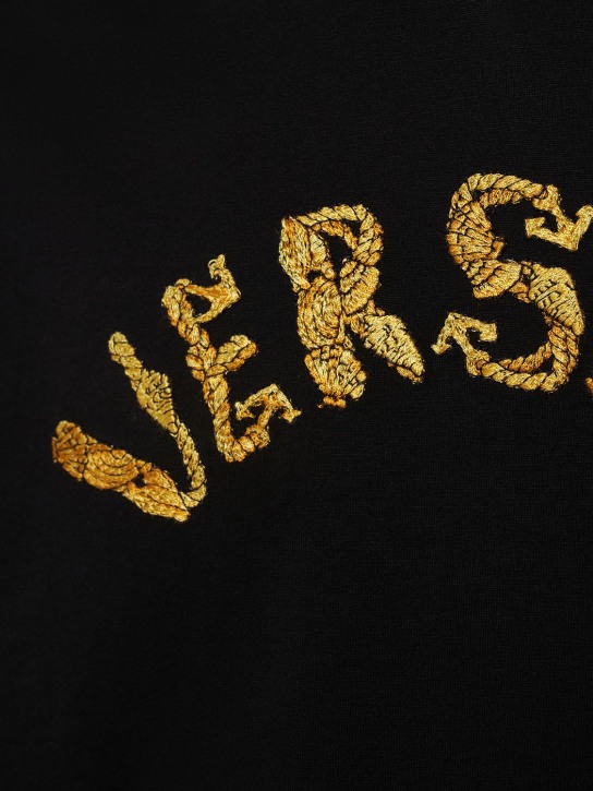 Versace: Camiseta de algodón con logo - Negro - men_1 | Luisa Via Roma