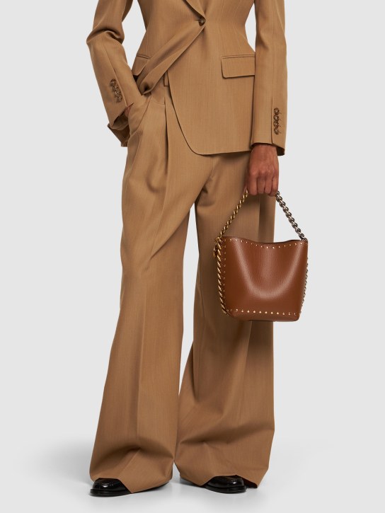 Stella McCartney: Studded faux grained leather bucket bag - Pecan - women_1 | Luisa Via Roma