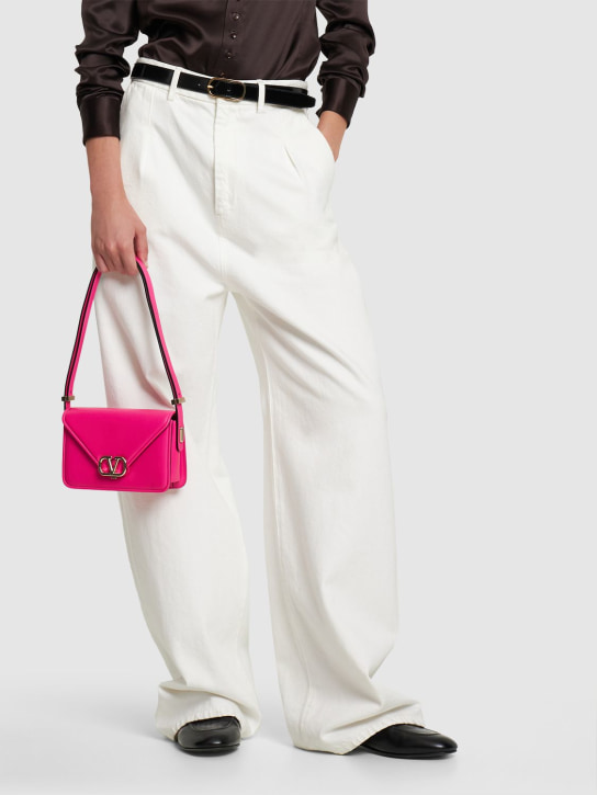 Valentino Garavani: Small V logo leather shoulder bag - Pink - women_1 | Luisa Via Roma
