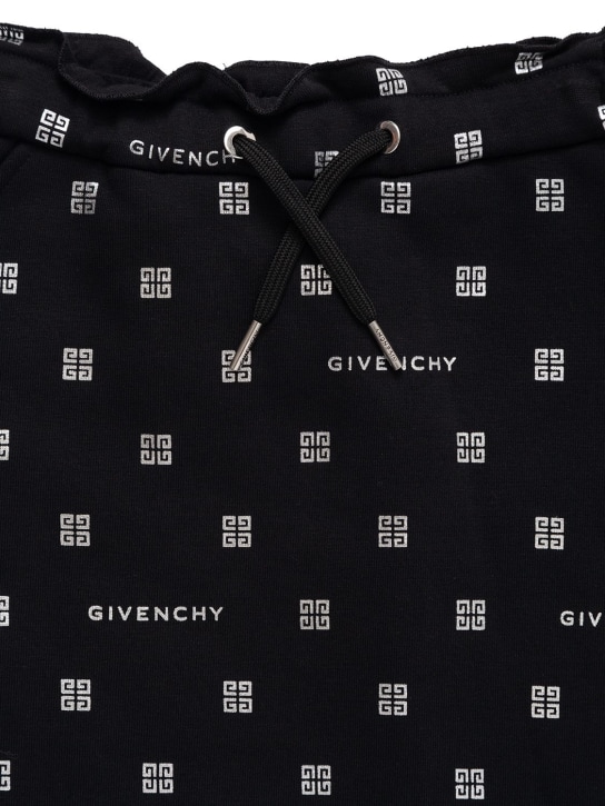 Givenchy: Jupe courte en jersey de coton imprimé logo - Noir - kids-girls_1 | Luisa Via Roma