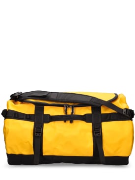 The North Face: 50L Base camp duffle bag - Yellow - men_0 | Luisa Via Roma