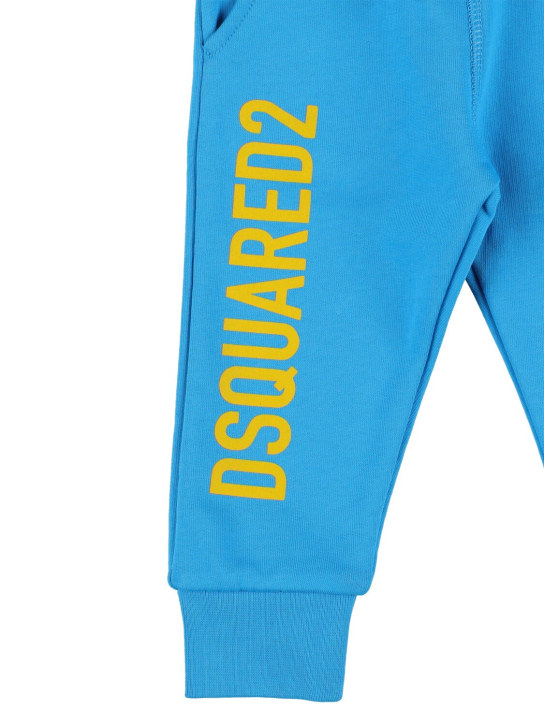 Dsquared2: Pantalon de survêtement en coton à imprimé logo - Bleu Clair - kids-boys_1 | Luisa Via Roma