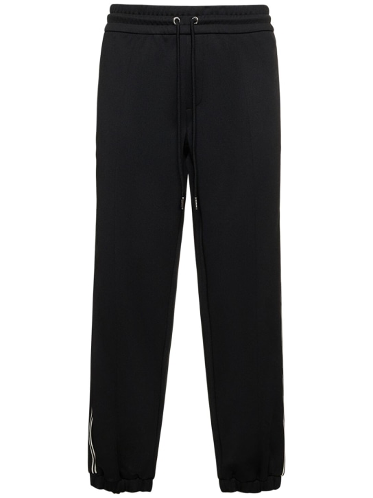 Moncler: Textured lightweight track pants - Black - men_0 | Luisa Via Roma