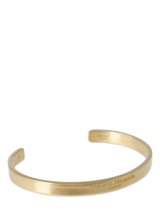 Maison Margiela: Medium logo engraved cuff - Gold - women_1 | Luisa Via Roma
