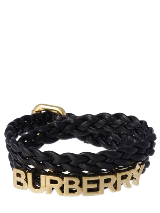 Burberry: Bracelet en cuir tressé à logo Burberry - Noir/Or - men_0 | Luisa Via Roma