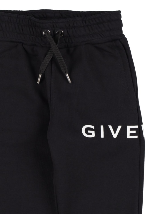 Givenchy: Jogging en coton mélangé imprimé logo - Noir - kids-boys_1 | Luisa Via Roma