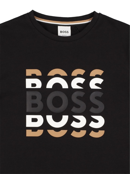 Boss: T-shirt en jersey de coton à logo caoutchouté - Noir - kids-boys_1 | Luisa Via Roma