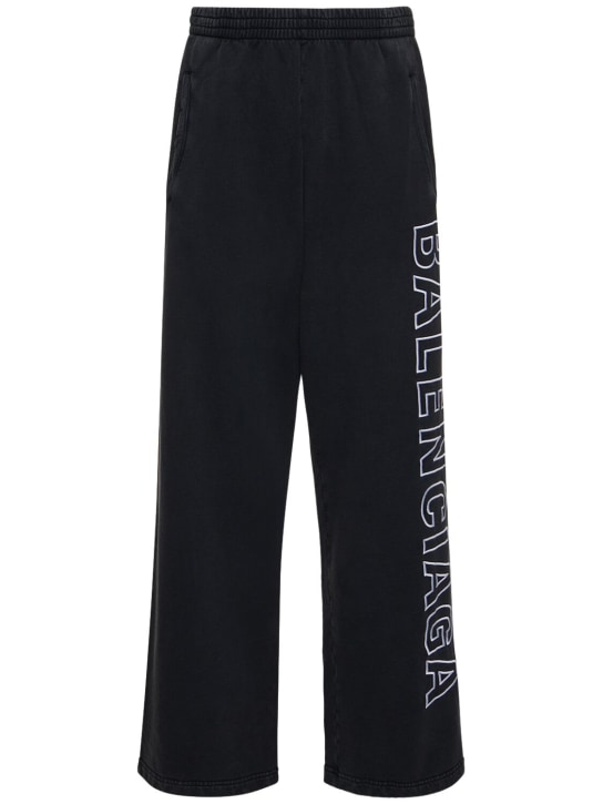 Balenciaga: Pantaloni baggy fit in felpa di cotone - Nero Delave' - men_0 | Luisa Via Roma