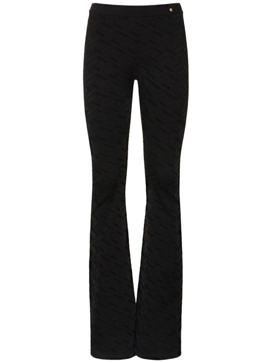 Versace: Logo jacquard knit viscose flared pants - Black - women_0 | Luisa Via Roma