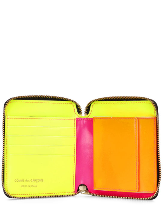 Comme des Garçons Wallet: Super Fluo leather wallet - Pink - men_1 | Luisa Via Roma