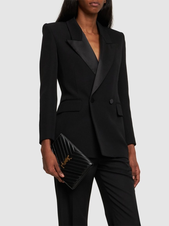 Saint Laurent: Cassandre matelassé leather flap pouch - Black - women_1 | Luisa Via Roma