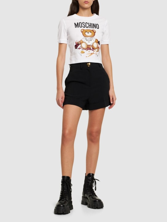 Moschino: Kürzeres T-Shirt aus Baumwolljersey mit Logo - women_1 | Luisa Via Roma