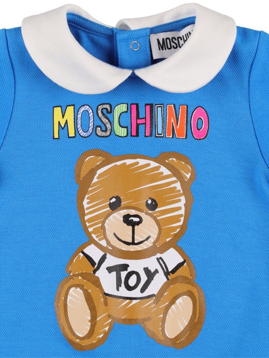 Moschino: Barboteuse en coton caoutchouté à logo - kids-boys_1 | Luisa Via Roma