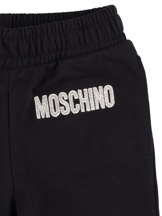 Moschino: Pantalon de survêtement en coton à imprimé logo - Noir - kids-girls_1 | Luisa Via Roma