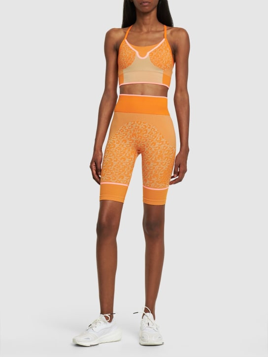 adidas By Stella McCartney: True Strength recycled tech sports bra - Orange - women_1 | Luisa Via Roma