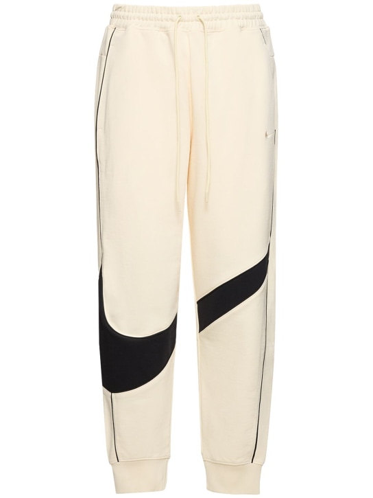 Nike: Pantaloni Swoosh in felpa di cotone - Coconut Milk/Bl - men_0 | Luisa Via Roma