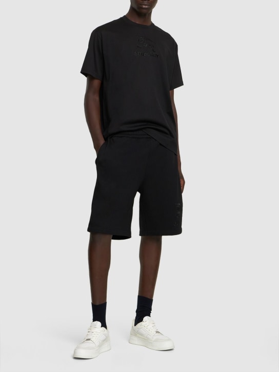 Burberry: Shorts de jersey con logo bordado - Negro - men_1 | Luisa Via Roma