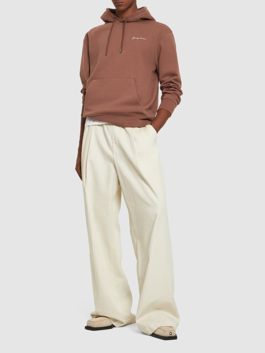 Jacquemus: Le Sweatshirt Brode cotton hoodie - Brown 1 - men_1 | Luisa Via Roma