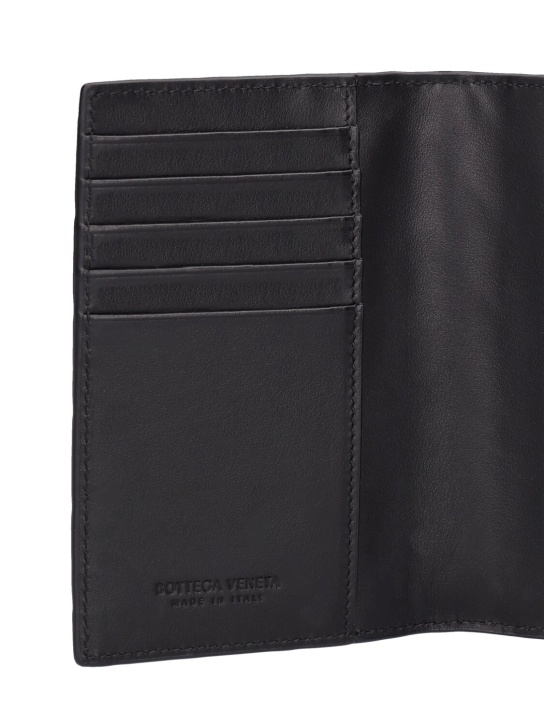 Bottega Veneta: Intrecciato leather passport case - Black - men_1 | Luisa Via Roma