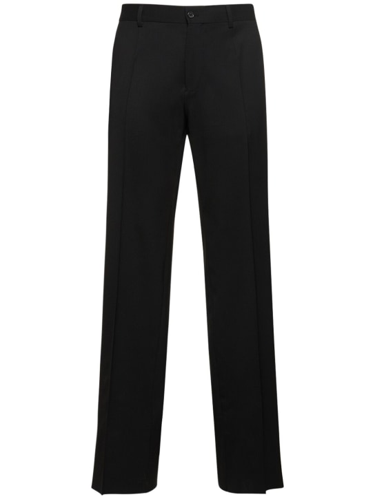 Dolce&Gabbana: Pantalones de lana stretch - Negro - men_0 | Luisa Via Roma