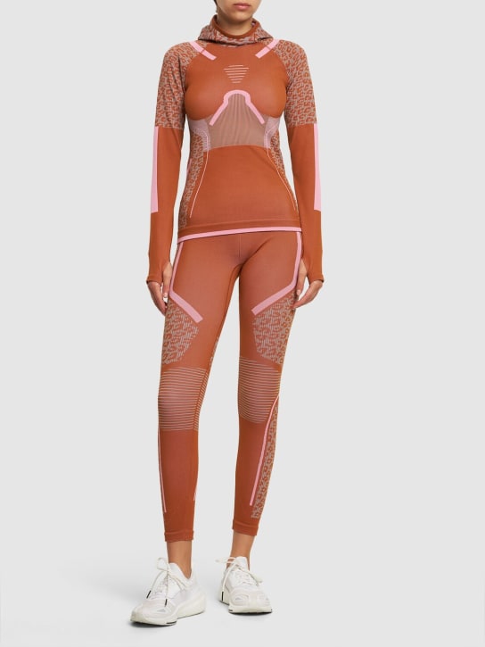 adidas By Stella McCartney: True Strength tech base-layer tights - Orange - women_1 | Luisa Via Roma