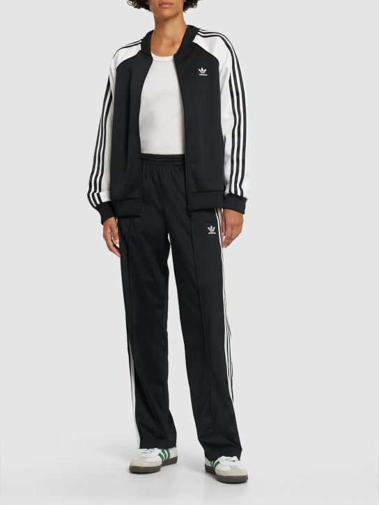 adidas Originals: Firebird科技织物运动裤 - 黑色 - women_1 | Luisa Via Roma