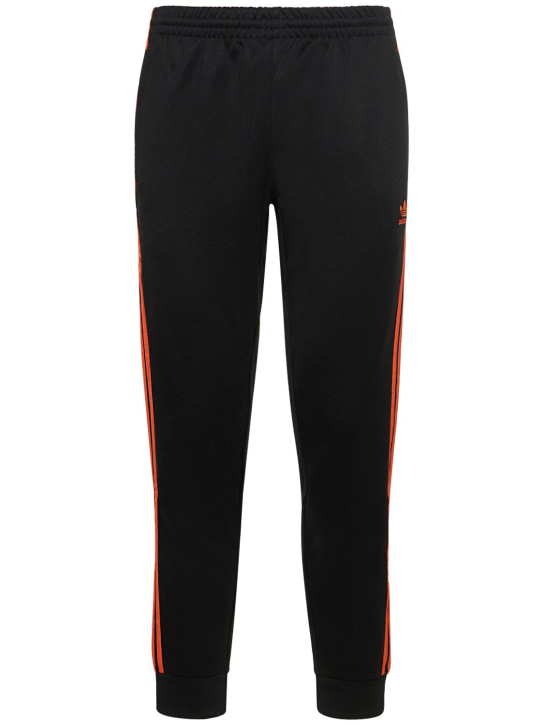 adidas Originals: 3-Stripes track pants - Black/Semoir - men_0 | Luisa Via Roma