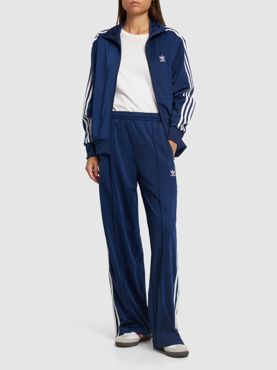 adidas Originals: Firebird wide tech track pants - women_1 | Luisa Via Roma