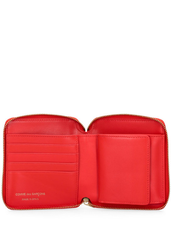 Comme des Garçons Wallet: Classic leather zip-around wallet - Orange - men_1 | Luisa Via Roma