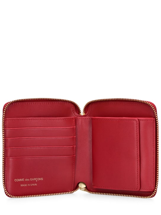 Comme des Garçons Wallet: Portefeuille zippé en cuir - Rouge - men_1 | Luisa Via Roma