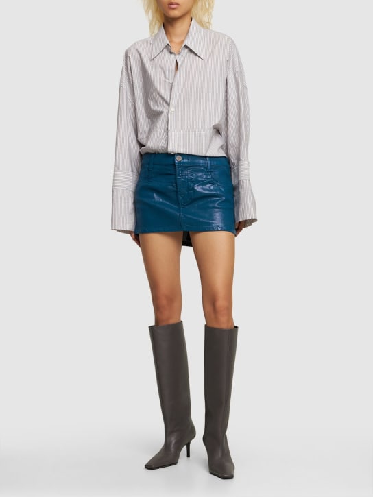 Vivienne Westwood: Crewe coated cotton denim mini skirt - Mavi - women_1 | Luisa Via Roma