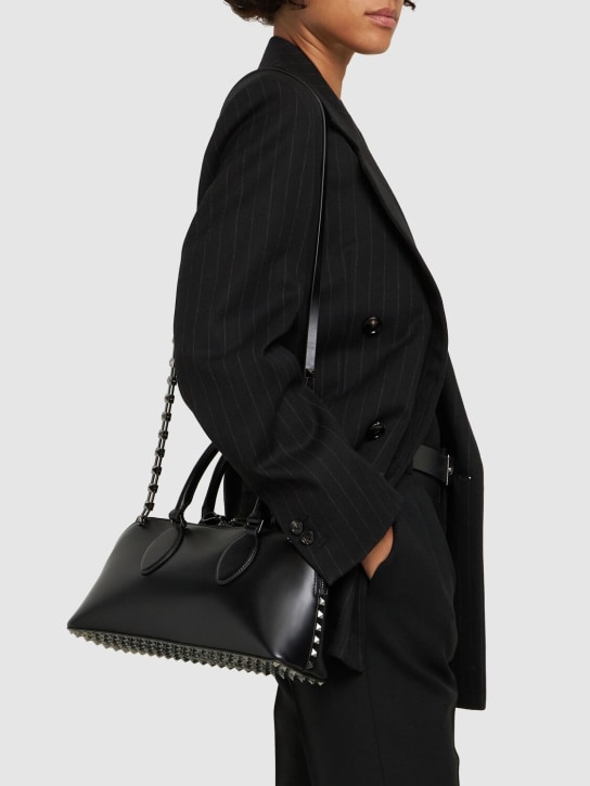 Valentino Garavani: Medium Duffle Rockstud leather bag - Black - women_1 | Luisa Via Roma