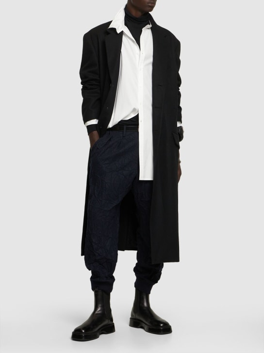 Yohji Yamamoto: G-hem wrinkled wool blend flannel pants - men_1 | Luisa Via Roma