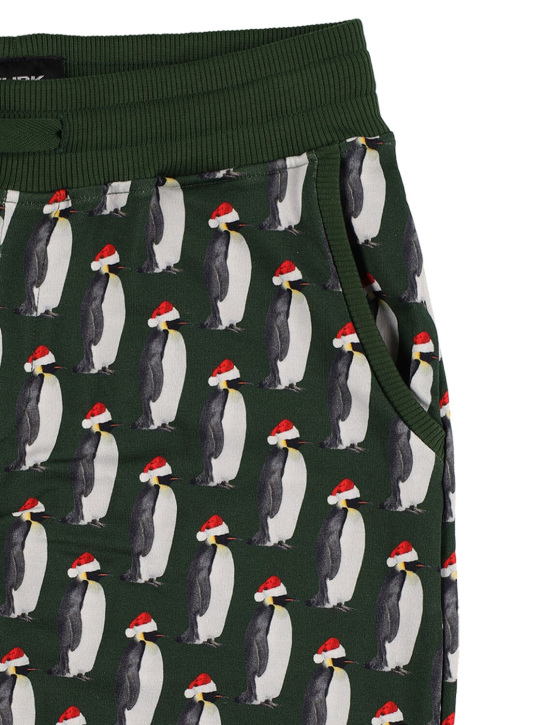 Snurk: Pantalon en coton biologique imprimé pingouin - Vert Foncé - kids-girls_1 | Luisa Via Roma