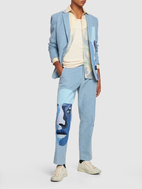 KidSuper Studios: Pantalon de costume côtelé Blue Face - Bleu/Multicolore - men_1 | Luisa Via Roma