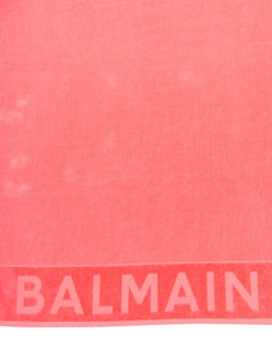 Balmain: Logo cotton terry beach towel - Coral - kids-boys_1 | Luisa Via Roma