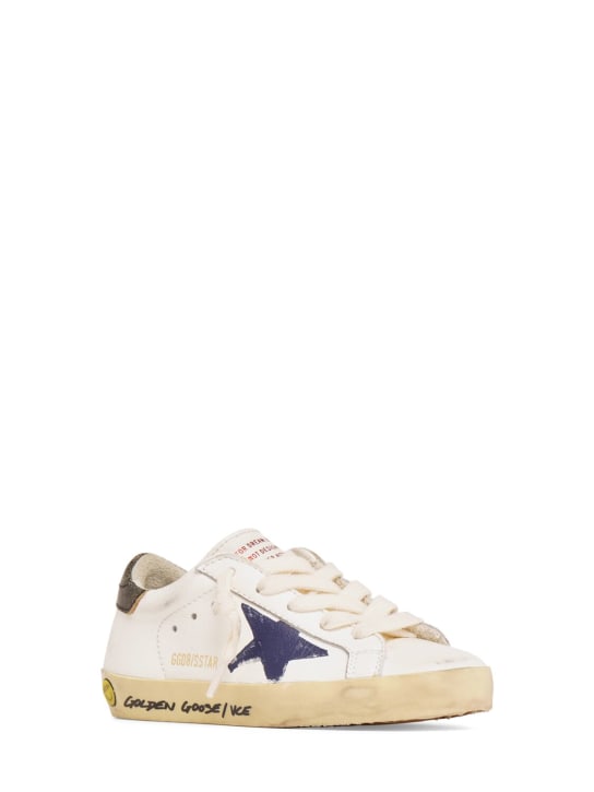 Golden Goose: Super-Star leather lace-up sneakers - White/Navy Blue - kids-girls_1 | Luisa Via Roma