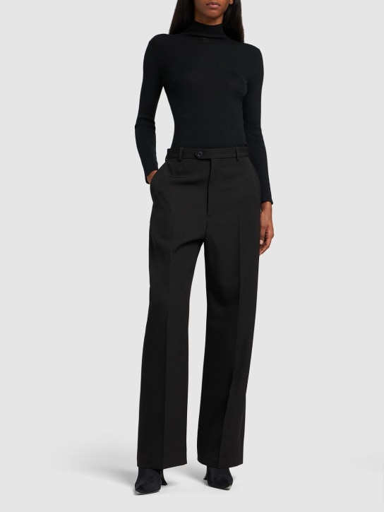 Balenciaga: Tailored wool baggy pants - Black - women_1 | Luisa Via Roma