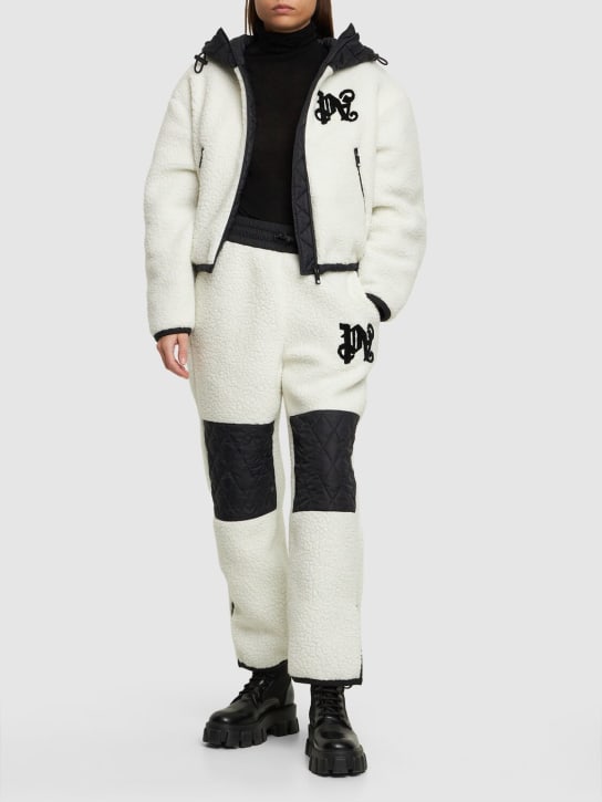 Palm Angels: Pantalon de ski en laine mélangée à monogramme - Blanc/Noir - women_1 | Luisa Via Roma