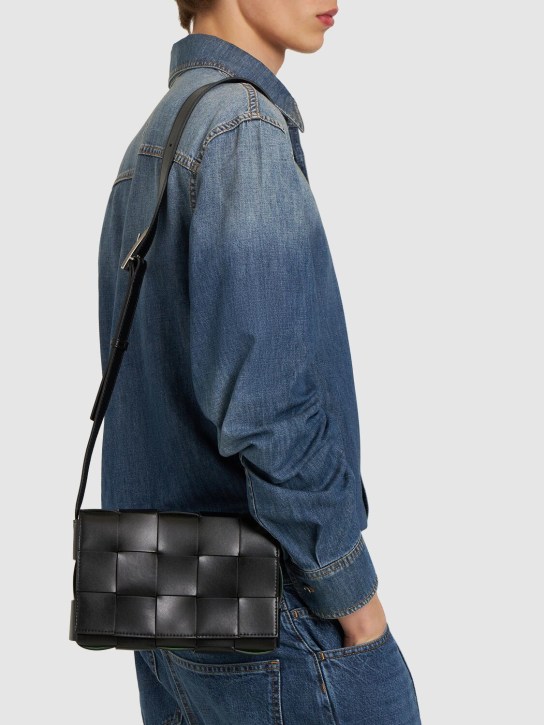 Bottega Veneta: Leather crossbody bag - Black/Parakeet - men_1 | Luisa Via Roma