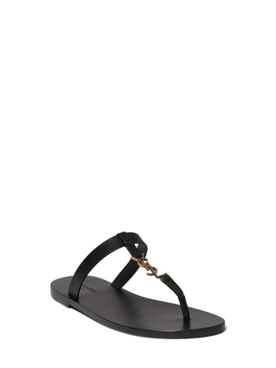Saint Laurent: Cassandre leather sandals - Black - men_1 | Luisa Via Roma