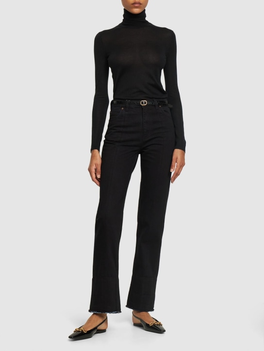 Victoria Beckham: High-waist tapered crop jeans - Black - women_1 | Luisa Via Roma