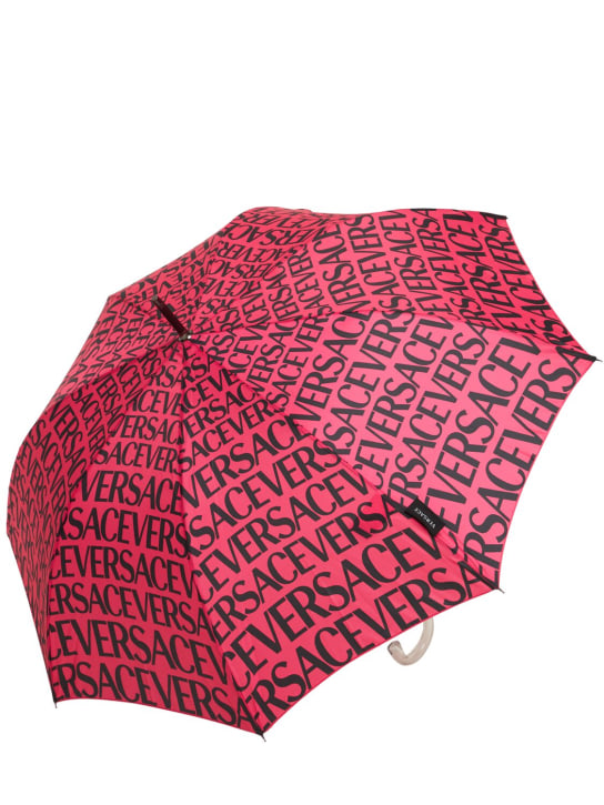 Versace: All over Versace logo printed umbrella - Fuchsia/Black - ecraft_1 | Luisa Via Roma