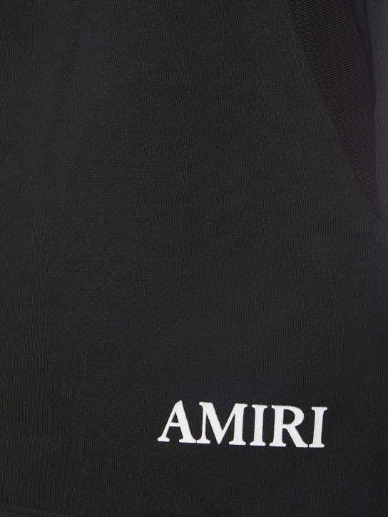 Amiri: Logo print tech swim shorts - Black - men_3 | Luisa Via Roma