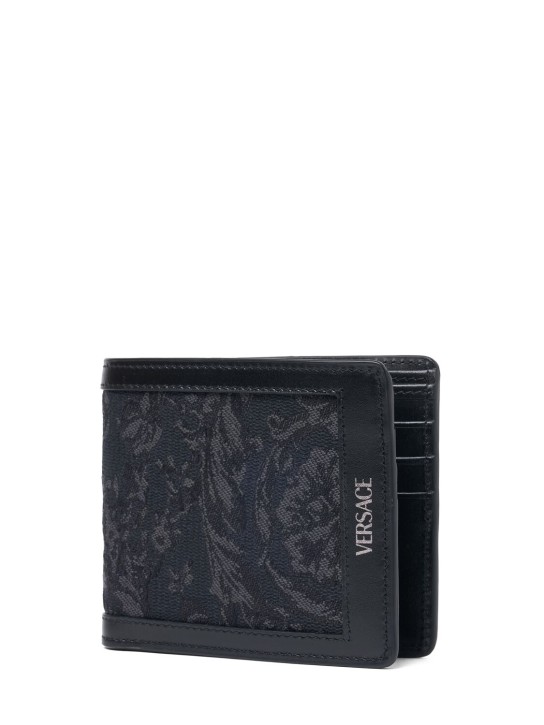 Versace: Jacquard & leather logo bifold wallet - Black Black - men_1 | Luisa Via Roma