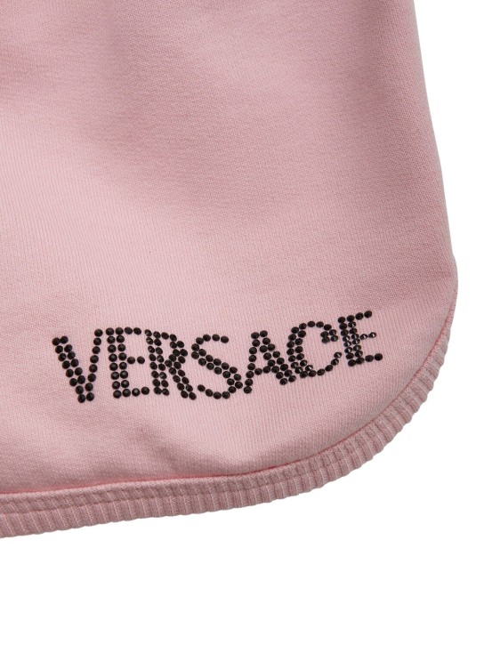 Versace: Shorts in jersey di cotone con logo - Rosa/Nero - kids-girls_1 | Luisa Via Roma